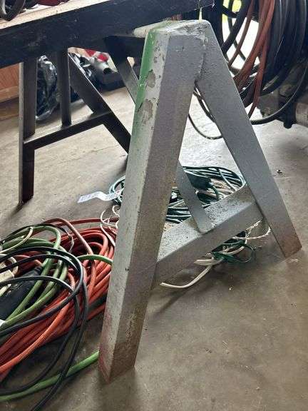 Two iron saw horses