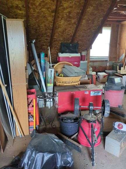 Contents of left half of attic, does not include trains in and on glass case