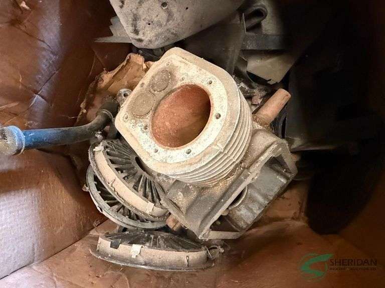 Box of assorted motor parts