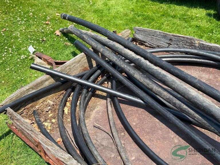 Irrigation pipes pieces and yard trailer
