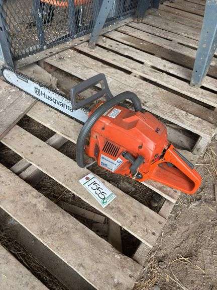 Husqvarna chain saw, bldg:green image