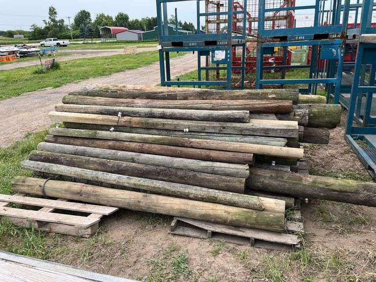 (64) treated 8' fence post, corner & line, row:4