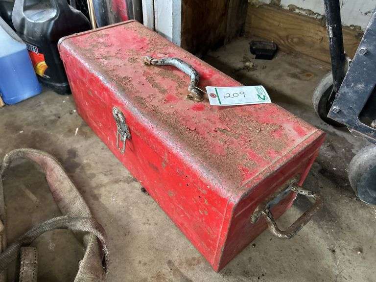 Red toolbox with miscellaneous tools