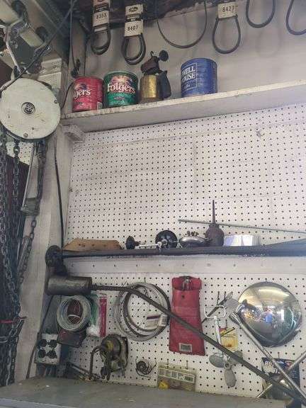 Contents of wall, brazing rod, belts, wire
