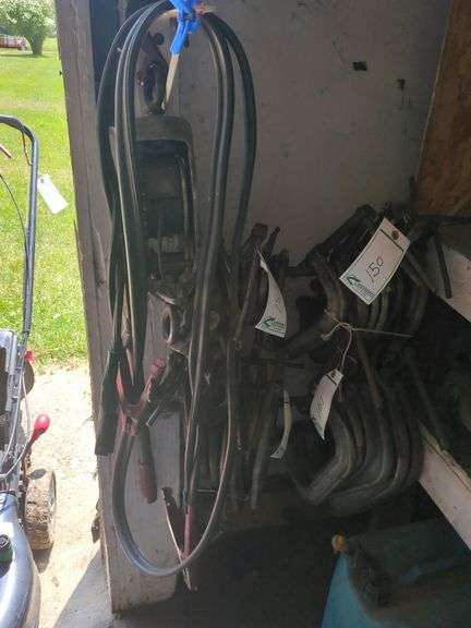 C-clamps, jumper cables, and come-along
