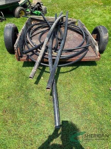 Irrigation pipes pieces and yard trailer