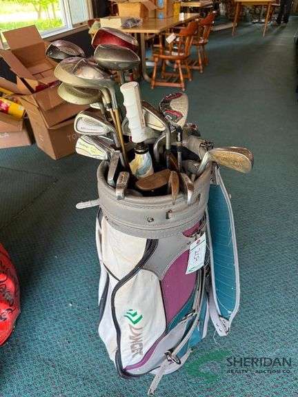 2 sets of rental clubs with bags