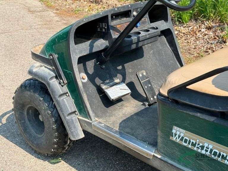 EZ-GO gas golf cart with dump box