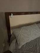 Queen size bed.  In basement bring help to load out.