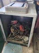 Bench model drill press includes cabinet and contents