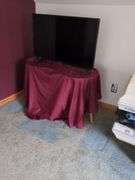 TV, end table, glass end table, platform to bed