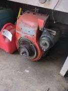 Vintage Kohler gas engine and 2 fuel cans