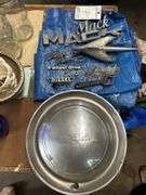 Tarps, auto trim items, and 2 DeSoto hubcaps