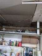 Contents of top shelf, sprayer, metal tool box