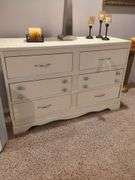 Dresser, pictures and candles