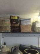 Shelf of nails, caps, and hoses