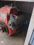 Vintage Kohler gas engine and 2 fuel cans