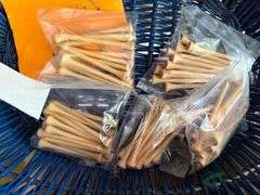 Numerous golf tees