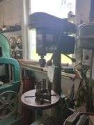 Bench model drill press includes cabinet and contents