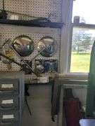 Contents of wall, brazing rod, belts, wire