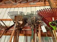 Numerous rakes and shovels