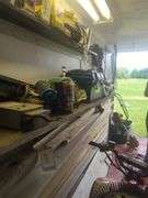 Contents of shelf, rubber made tool box with tools, battery charger, metal tool box, does not include jugs