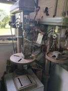 Bench model drill press includes cabinet and contents