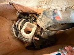 Box of assorted motor parts