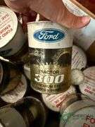 3 Gas cans and box of oil