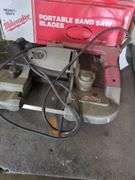 Milwaukee Electric portable band saw