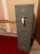 4 Drawer file cabinet Peg board and flower cabinet