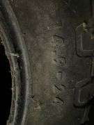 2 Loaded tires on rims and one tire 14.9-24