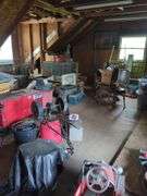 Contents of left half of attic, does not include trains in and on glass case