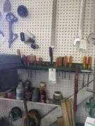 Screw drivers, contents of small shelf, hanging tools