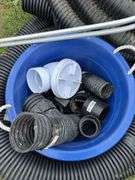 Misc. drain tile plastic fittings, drain, check valve, and 6" 21' perf. plastic corrugated 3" 29' perf. pipe & 4" 53' non-perf. row:4