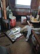 Contents of left half of attic, does not include trains in and on glass case