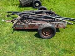 Irrigation pipes pieces and yard trailer