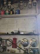 Contents of wall, brazing rod, belts, wire
