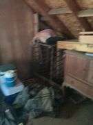 Contents of left half of attic, does not include trains in and on glass case