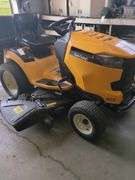 Cub Cadet XT1 riding lawn mower with clipping bagger