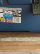 Contents of shelf, rubber made tool box with tools, battery charger, metal tool box, does not include jugs
