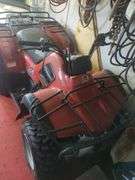 Bush hog 175cc quad; ran when placed in storage over a year ago.  Running status unknown currently.