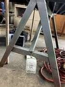 Two iron saw horses