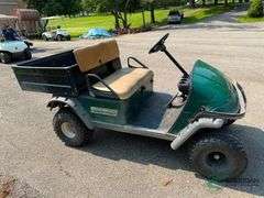 EZ-GO gas golf cart with dump box