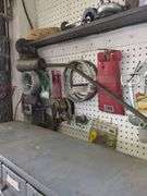Contents of wall, brazing rod, belts, wire