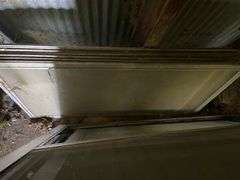 Assorted storm windows and door