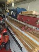 Contents of shelf, rubber made tool box with tools, battery charger, metal tool box, does not include jugs
