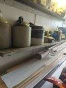 Contents of shelf, rubber made tool box with tools, battery charger, metal tool box, does not include jugs