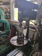 Bench model drill press includes cabinet and contents