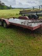 Dual axle flat bed trailer